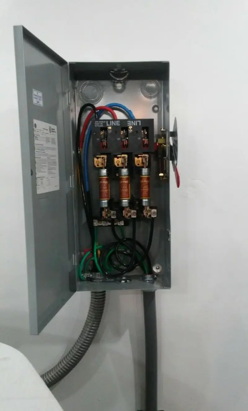 Three-phase disconnect switch installed for Smoke Detector Installation in Clinton
